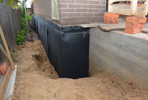 Happy homeowners after waterproofing job in Hume